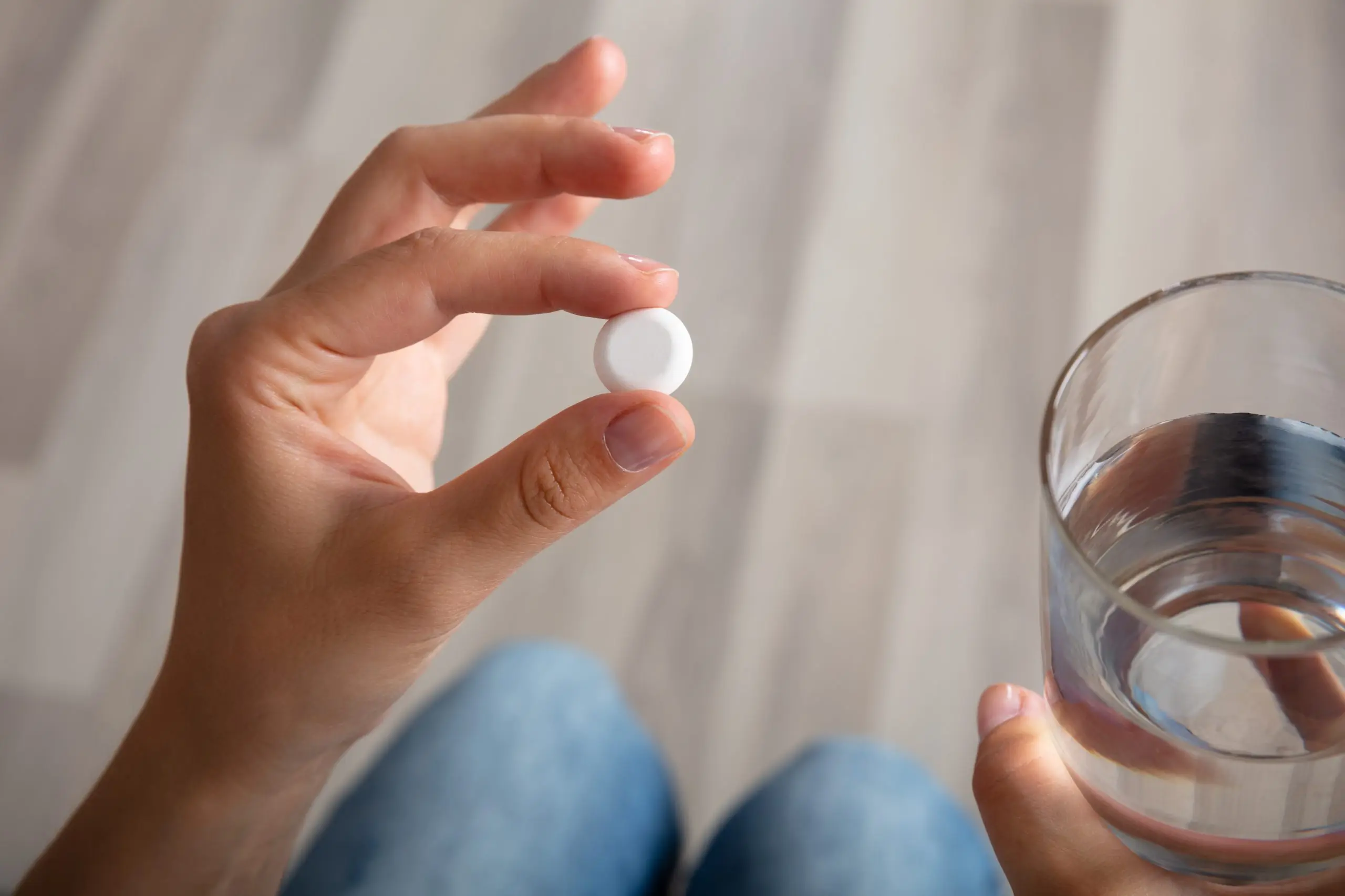 looking_at_pill_water